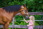 child and Quarter Horse