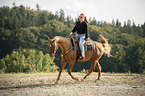 woman rides Quarter Horse