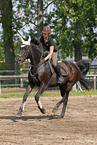 woman rides horse