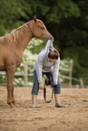 woman and arabian horse