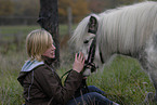 young woman with Shetlandpony