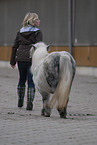 young woman with Shetlandpony