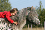 girl with shetland pony