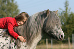girl with shetland pony