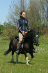 woman rides Shetland Pony