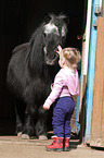 child with Shetland Pony