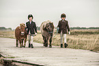 kids with Shetland Ponies