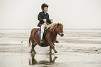 boy rides Shetland Pony