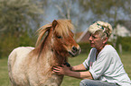 woman and Shetland Pony stallion