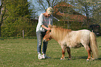 woman and Shetland Pony stallion