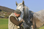 man and Shire Horse