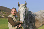 man and Shire Horse