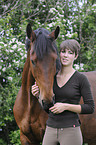 woman and Trakehner