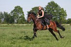 woman rides trotter