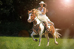 woman rides warmblood