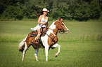 woman rides warmblood