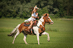 woman rides warmblood