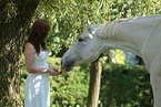 woman and white horse