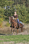 woman rides Horse