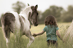 girl with Warmblood foal