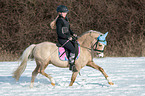 woman rides Welsh B