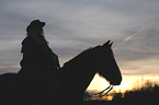 woman and Welsh-Cob D