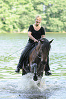woman rides Welsh-Cob