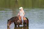 woman rides Welsh-Cob