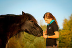 young woman with Welsh Cob