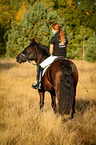 young woman with Welsh Cob