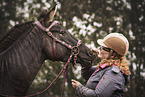 woman and zebra-horse