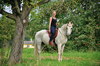 woman rides Lipizzan-Horse-Cross