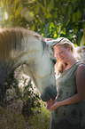 woman and Haflinger-Andalusian
