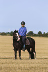 girl rides Tinker-Cross