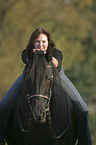 friesian with horsewoman