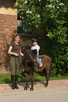 mother with pony and daughter