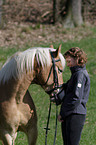 young woman with Haflinger