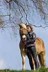 young woman with Haflinger