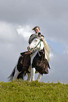 young woman riding Irish Tinker