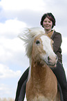 young woman with horse