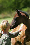 woman with foal