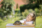 girl with Greek tortoise