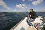 fisher with cod