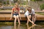 childs with Koi