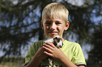 boy with Abyssinian guinea pig