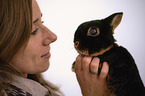 woman and dwarf rabbit