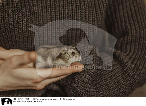 woman with dwarf Hamster / LB-01691