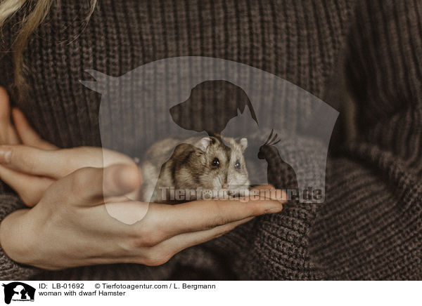 woman with dwarf Hamster / LB-01692