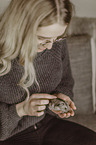 woman with dwarf Hamster