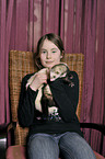 child with ferrets